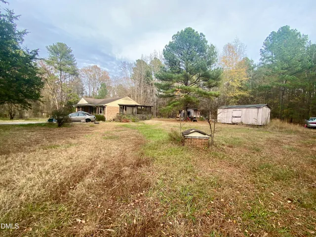 a view of a town with trees and houses