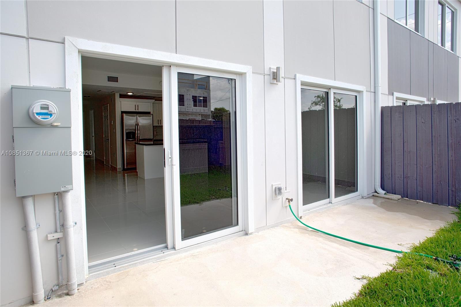 13724 Southwest 259th Street Homestead, FL 33032 - Photo 18 of 20 an outdoor space with view in front door