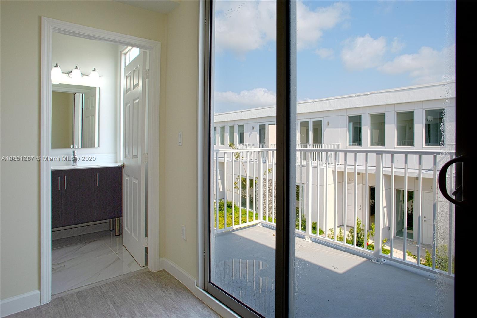 13724 Southwest 259th Street Homestead, FL 33032 - Photo 10 of 20 a view of a balcony from a door