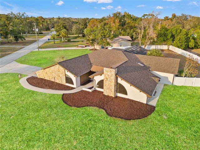 an aerial view of a house having garden