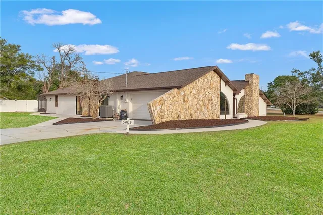 $597,700 | 5404 Glover Drive, Spring Hill, FL 34607