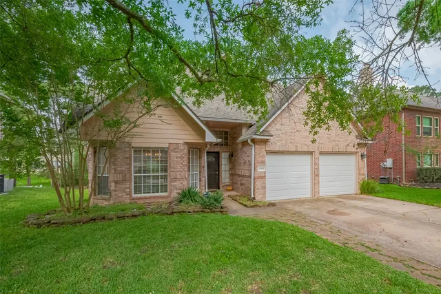 front view of a house and a yard