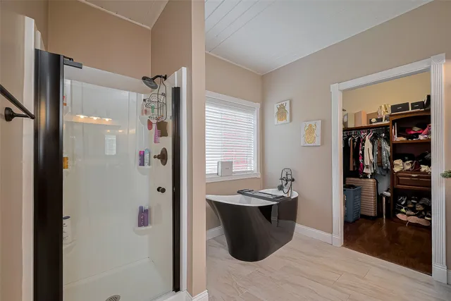 a kitchen with a refrigerator and a sink
