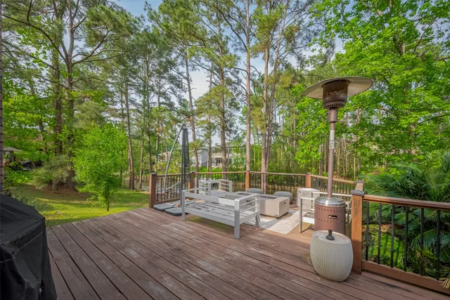 a view of a chairs and table on the wooden floor