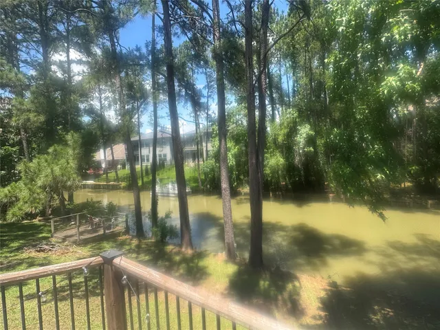 a view of swimming pool from a lake view