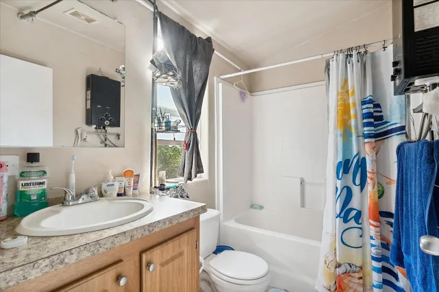 a bedroom with a bed and a closet