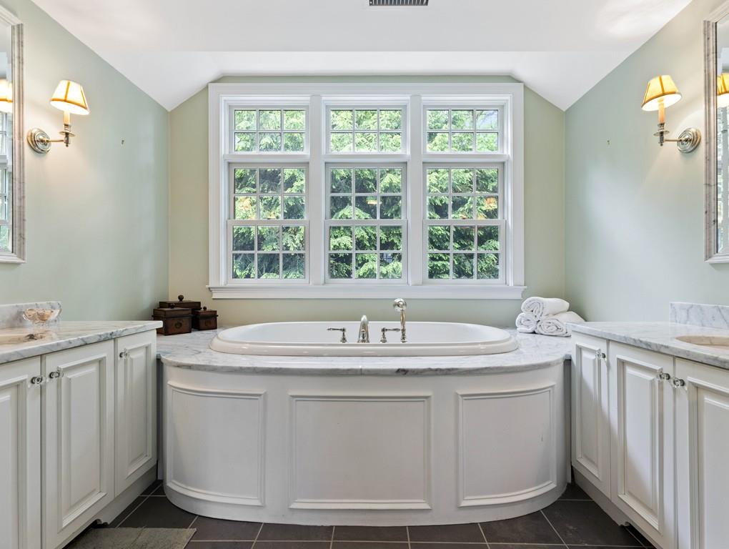 38 Kenilworth Road Wellesley, MA 02482 - Photo 21 of 36 a bathroom with a sink and a window