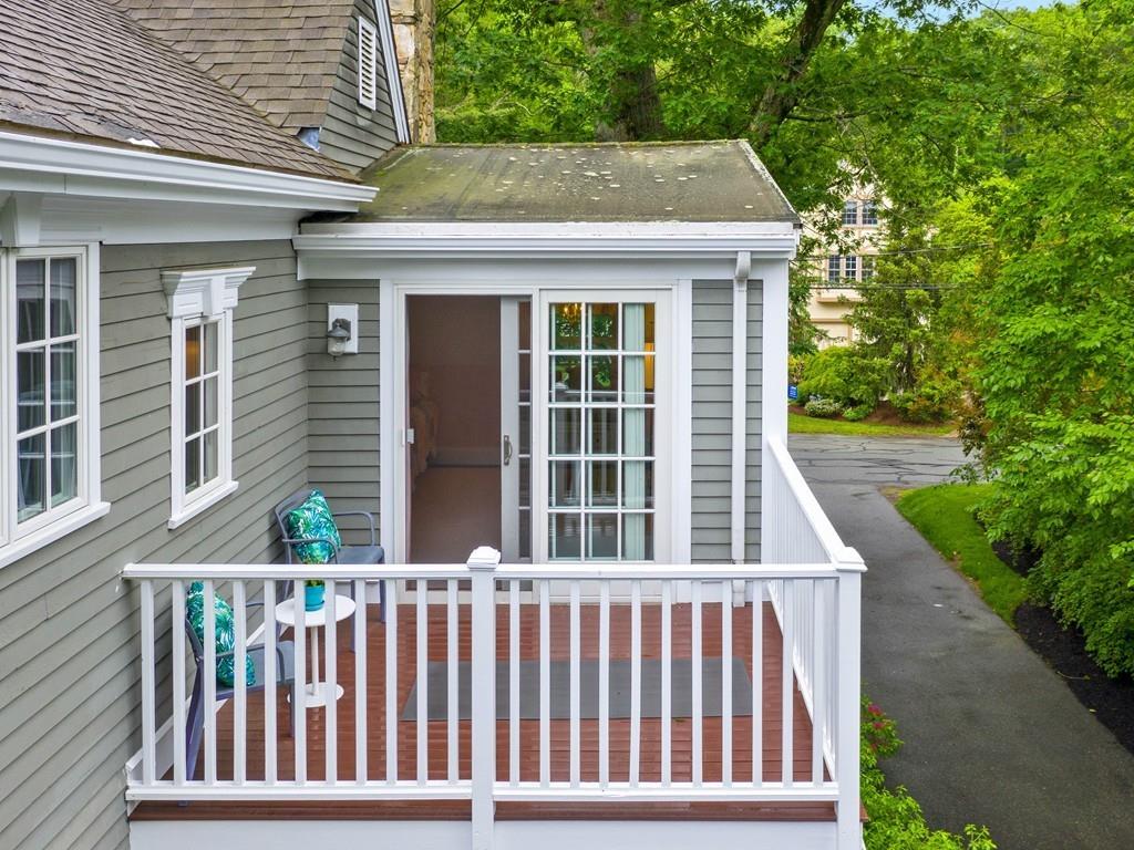 38 Kenilworth Road Wellesley, MA 02482 - Photo 26 of 36 a view of a brick house with a large window