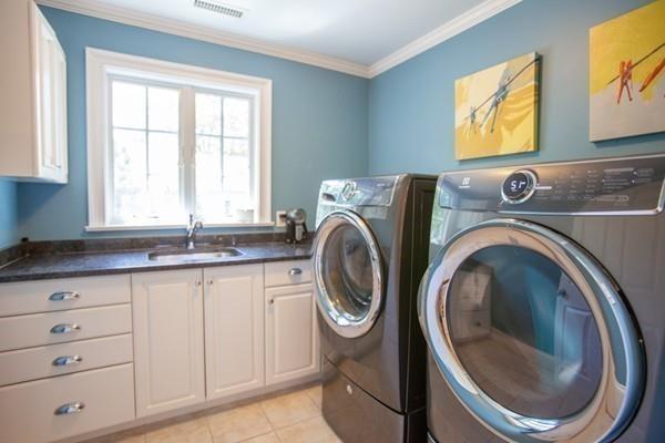 38 Kenilworth Road Wellesley, MA 02482 - Photo 29 of 36 a utility room with sink dryer and washer