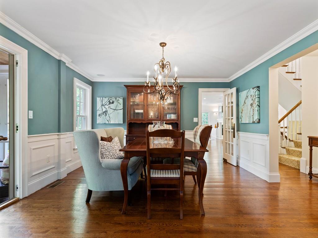 38 Kenilworth Road Wellesley, MA 02482 - Photo 7 of 36 a dining room with furniture a chandelier and wooden floor