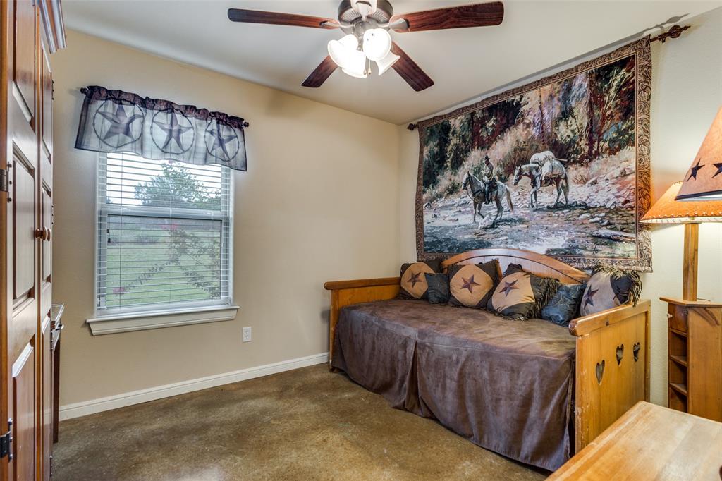 129 Ronnie Lane Weatherford, TX 76088 - Photo 22 of 36 a living room with furniture and a window