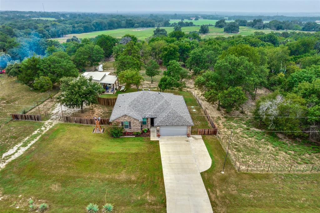 129 Ronnie Lane Weatherford, TX 76088 - Photo 32 of 36 an aerial view of a house with yard swimming pool and outdoor seating