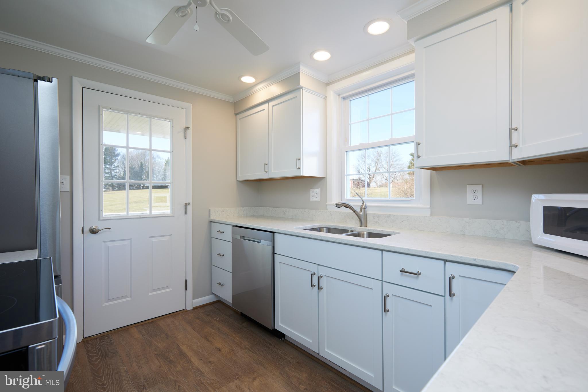 18325 Barnesville Road Barnesville, MD 20838 - Photo 10 of 31 Back door to covered porch and deck