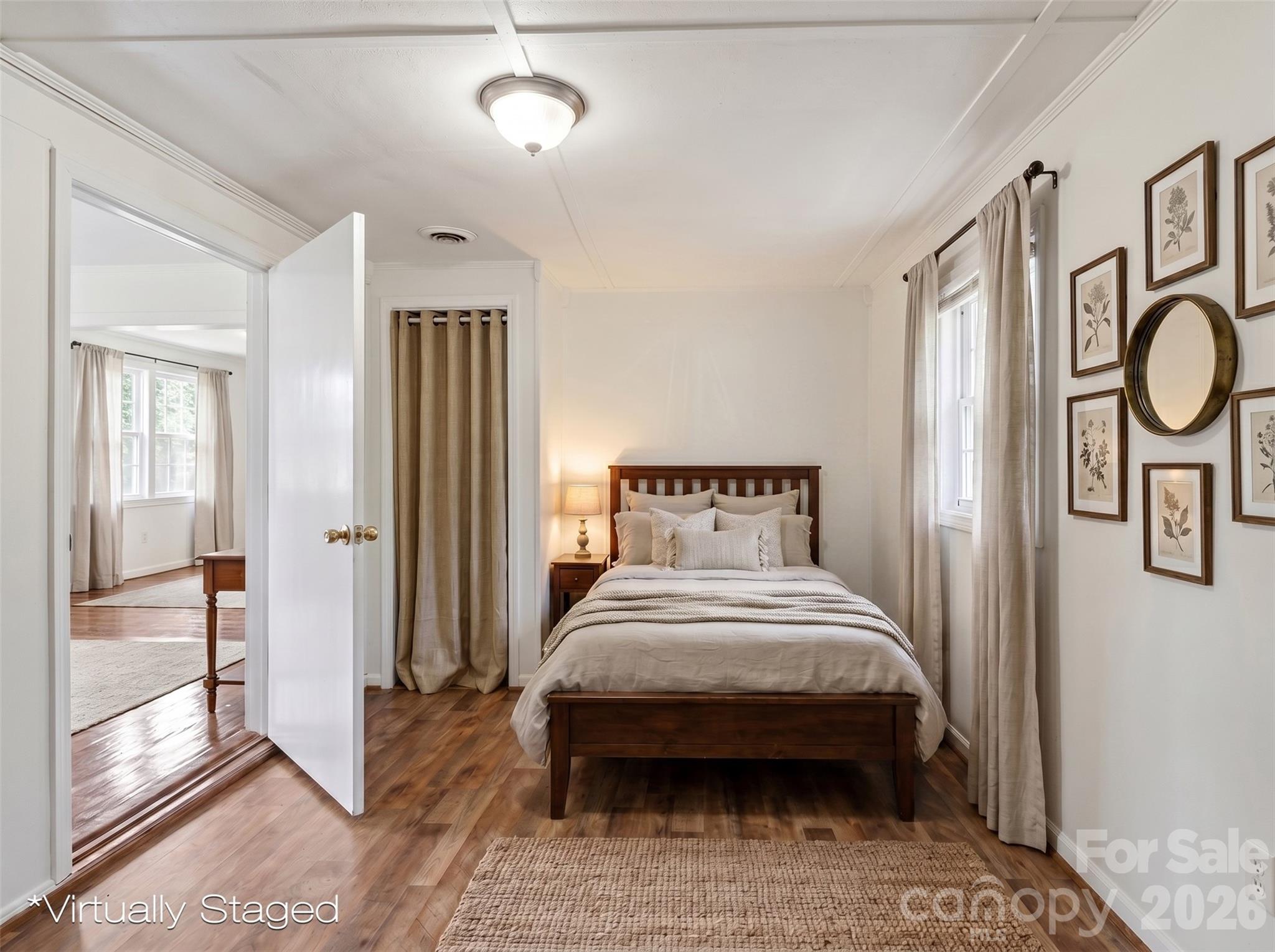 128 Ella Street Chester, SC 29706 - Photo 7 of 18 a bedroom with bed and sliding door