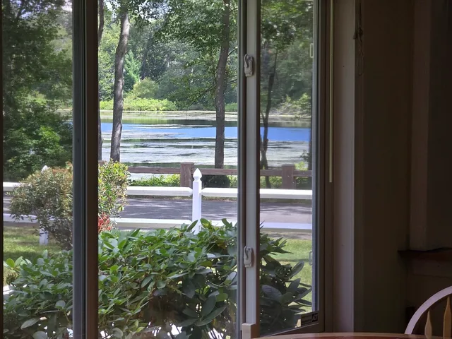 a bathroom with a toilet and a bathtub