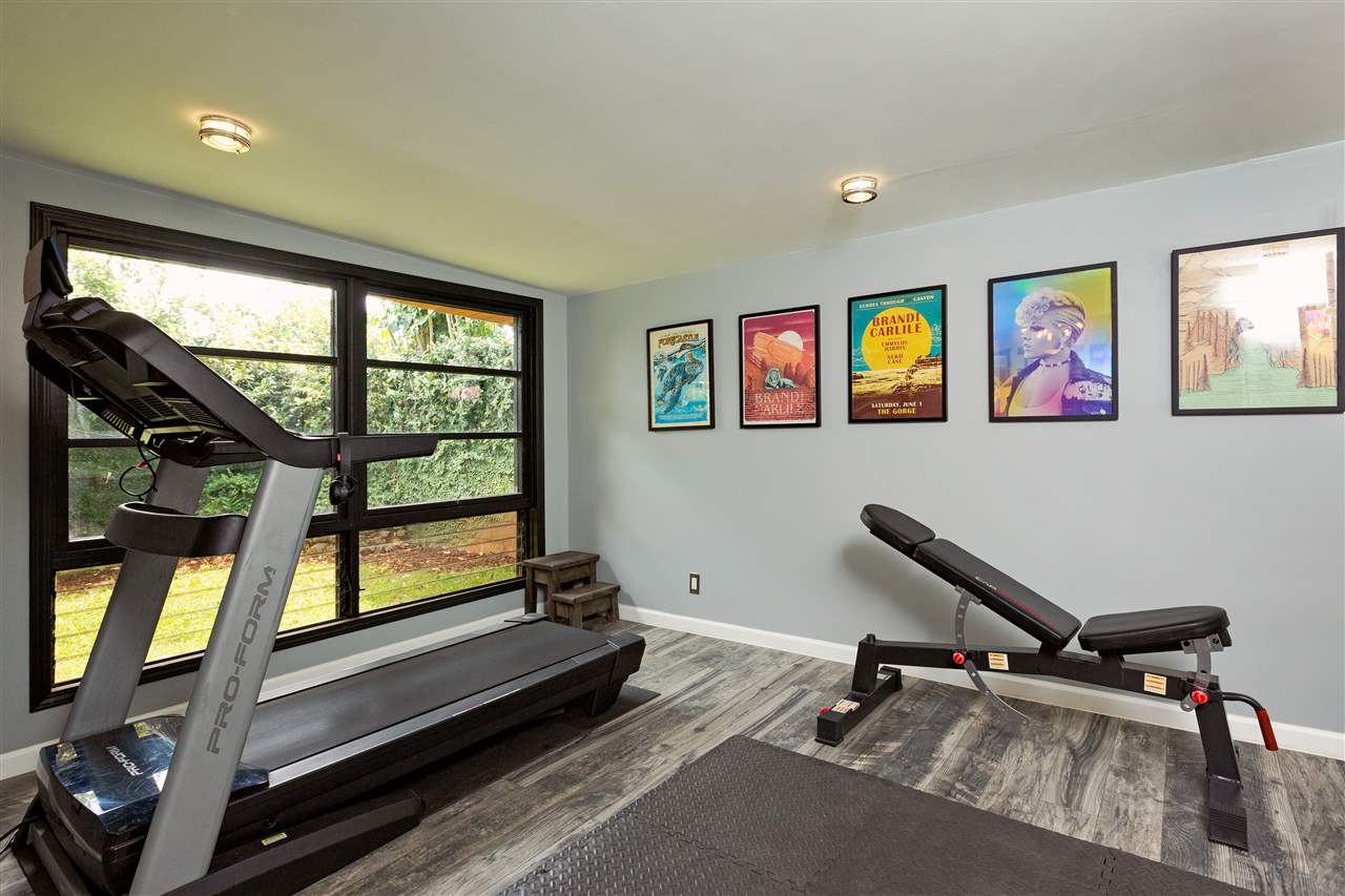 805 Kuulei Street Haiku, HI 96708 - Photo 15 of 28 a room with gym equipment and windows
