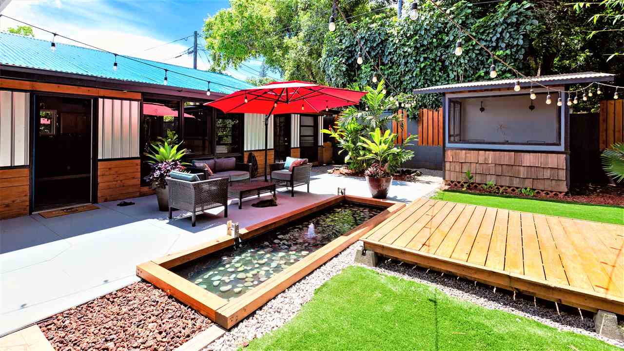 805 Kuulei Street Haiku, HI 96708 - Photo 19 of 28 a view of an outdoor sitting area with furniture and garden