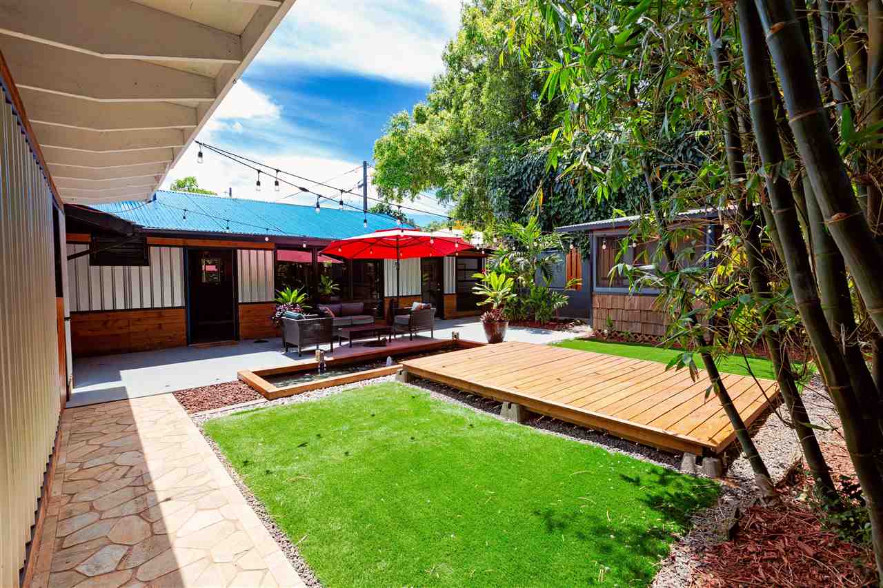805 Kuulei Street Haiku, HI 96708 - Photo 20 of 28 a view of an house with backyard and patio