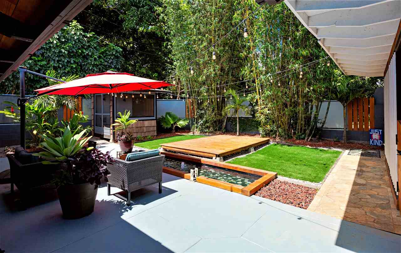 805 Kuulei Street Haiku, HI 96708 - Photo 21 of 28 a view of a backyard with sitting area and furniture