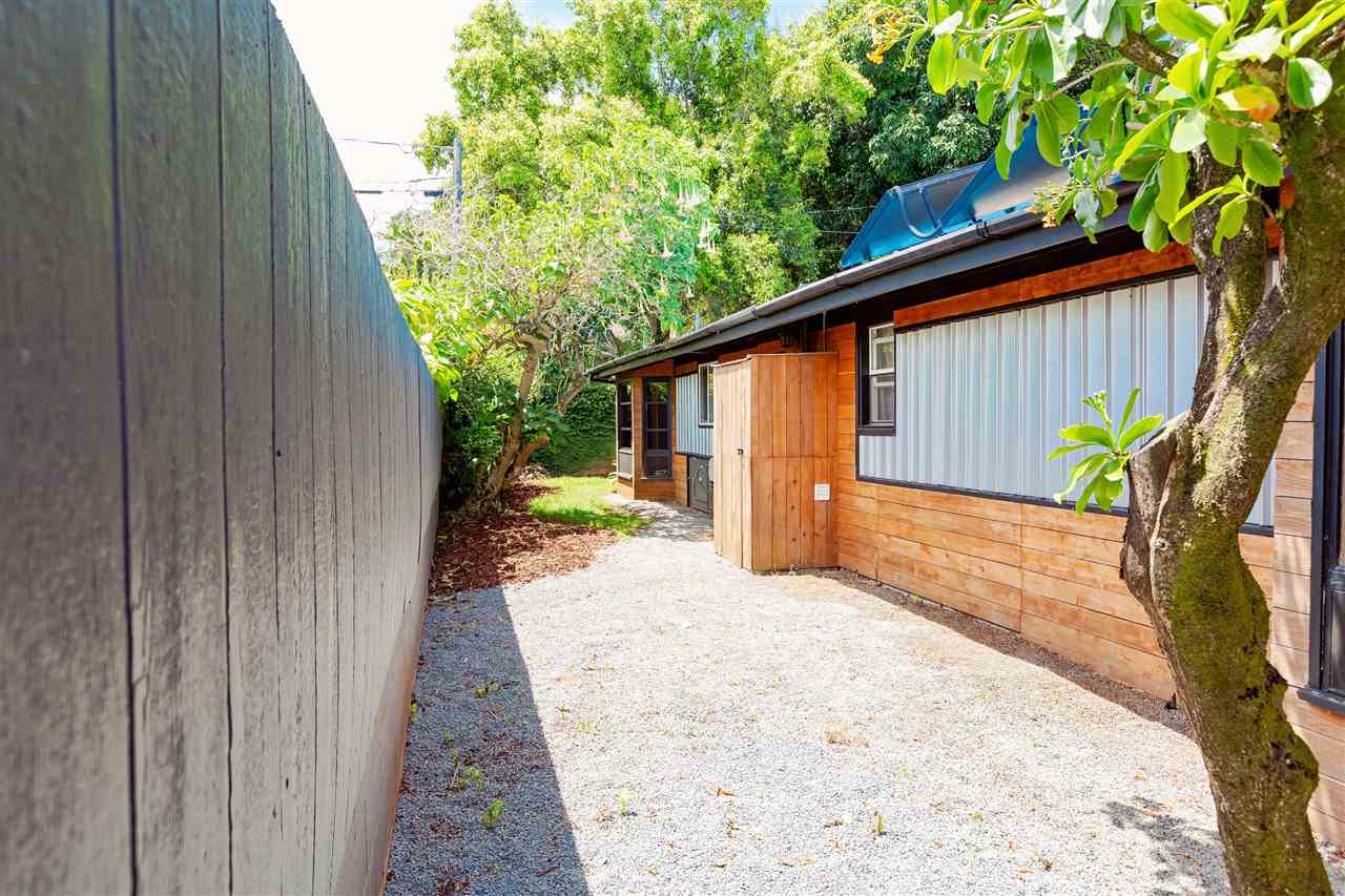 805 Kuulei Street Haiku, HI 96708 - Photo 26 of 28 a view of a backyard with potted plants