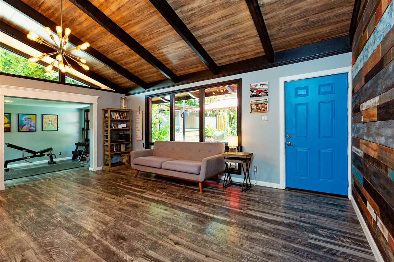 805 Kuulei Street Haiku, HI 96708 - Photo 7 of 28 a view of a room with furniture window and wooden floor