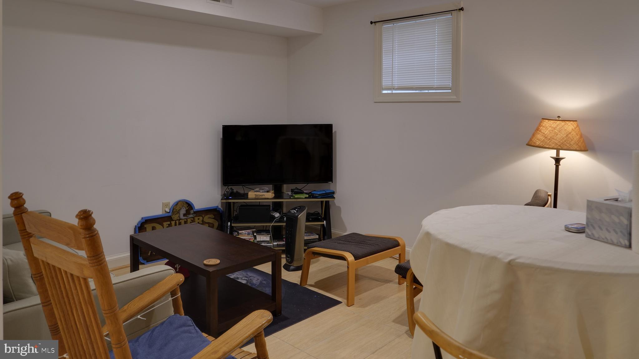 1402 Foxhall Road Northwest Washington, DC 20007 - Photo 15 of 16 lower level living area