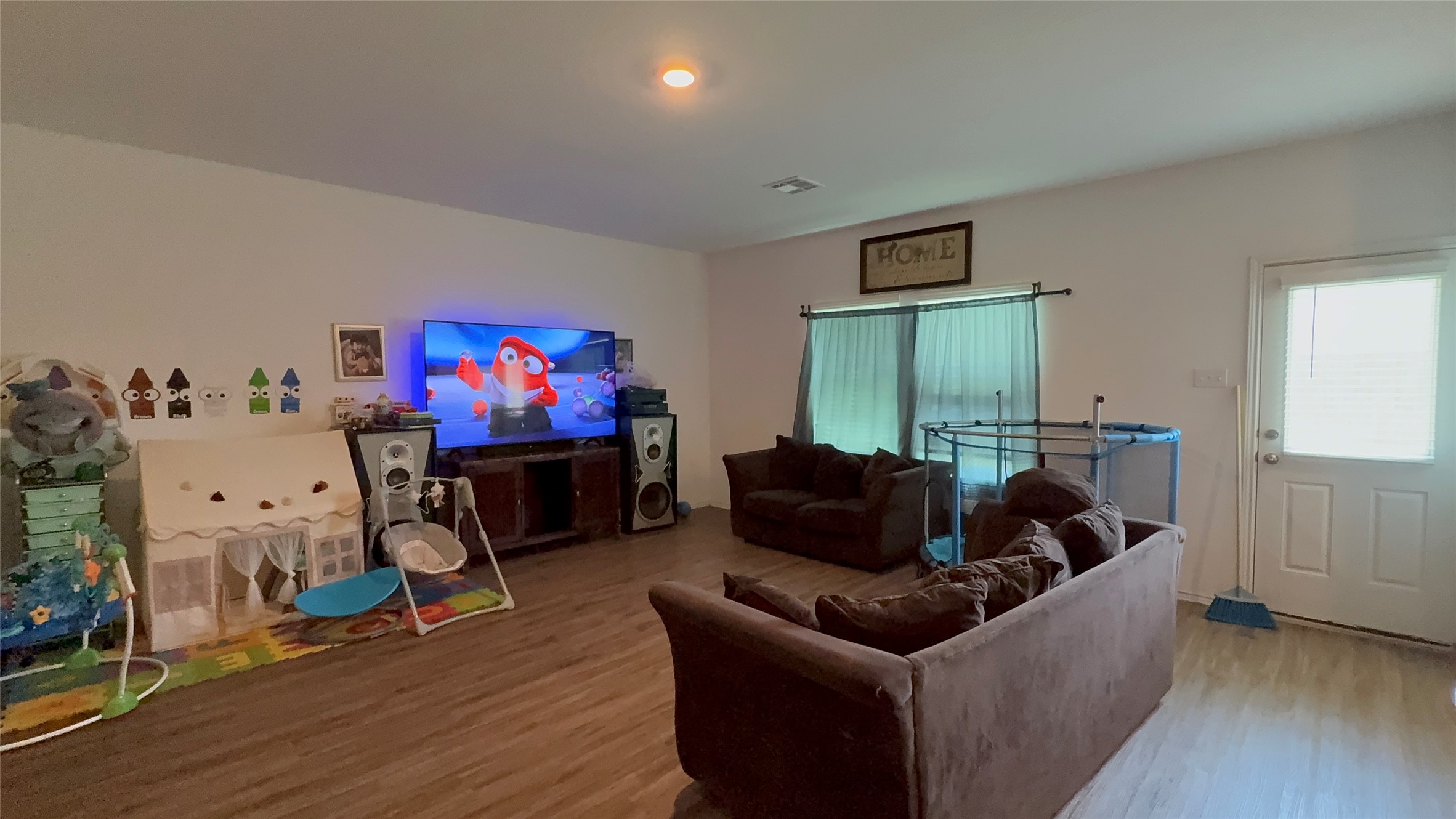 316 Geode Glen Maxwell, TX 78656 - Photo 4 of 24 a living room with furniture and a flat screen tv