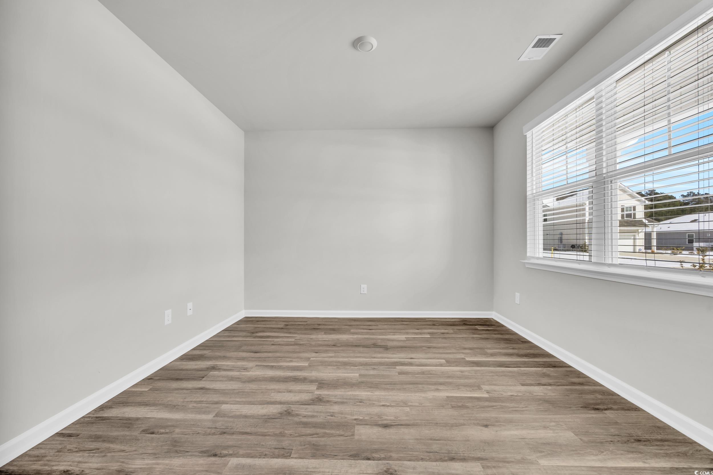 545 Goldstar Street Conway, SC 29526 - Photo 12 of 37 Empty room featuring light hardwood / wood-style f