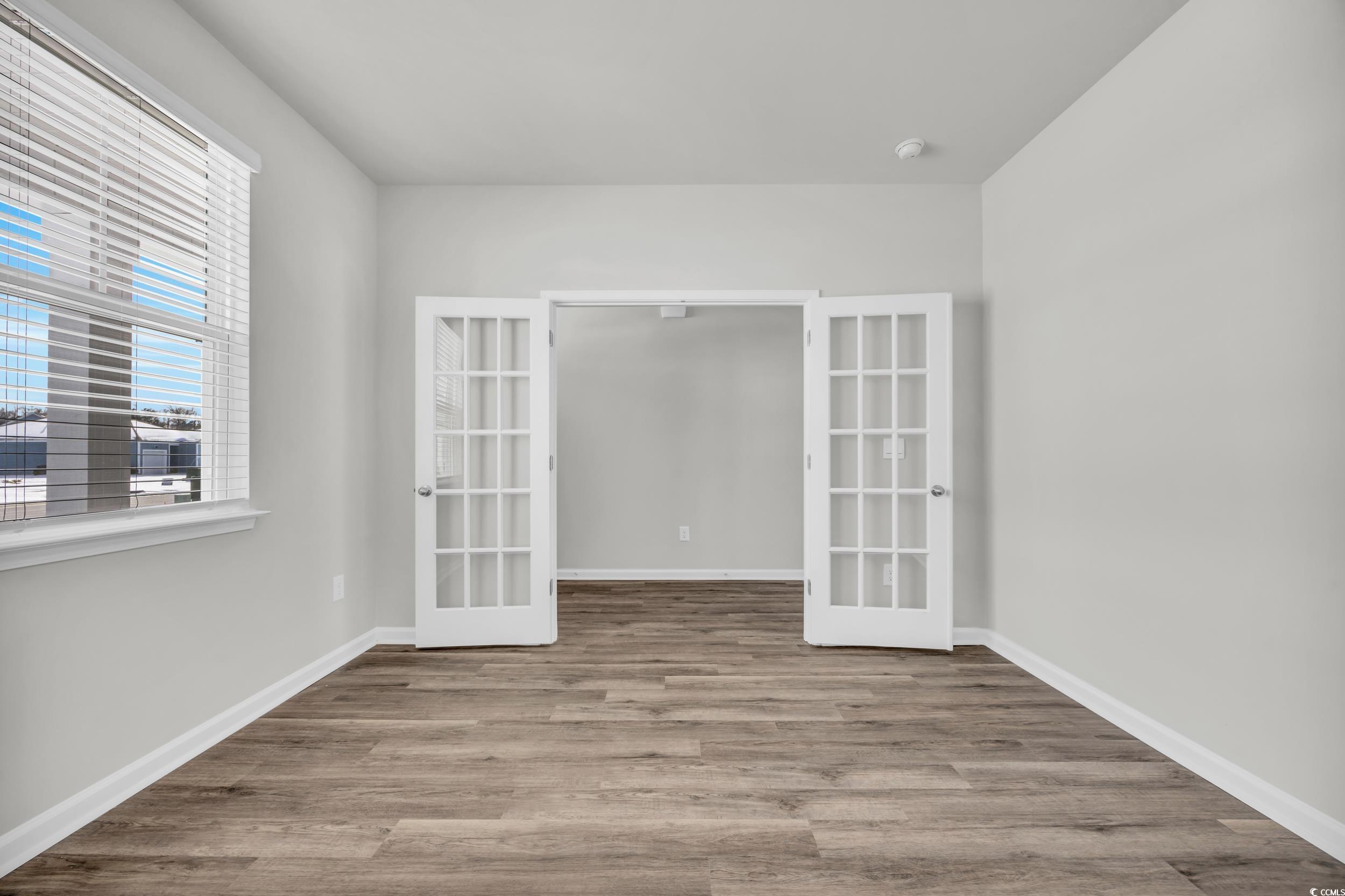 545 Goldstar Street Conway, SC 29526 - Photo 13 of 37 Empty room with light hardwood / wood-style floors