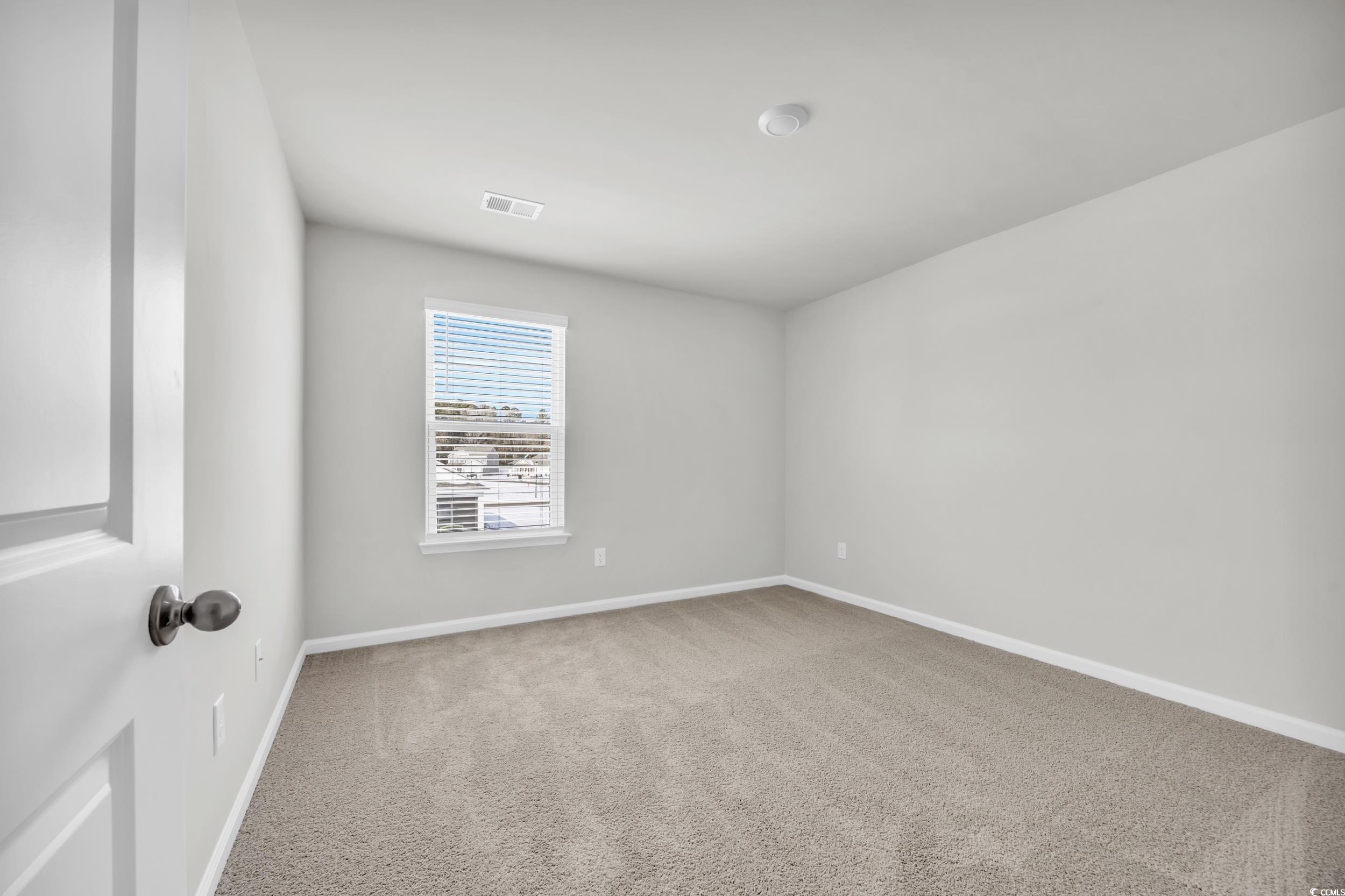 545 Goldstar Street Conway, SC 29526 - Photo 23 of 37 Empty room with carpet flooring