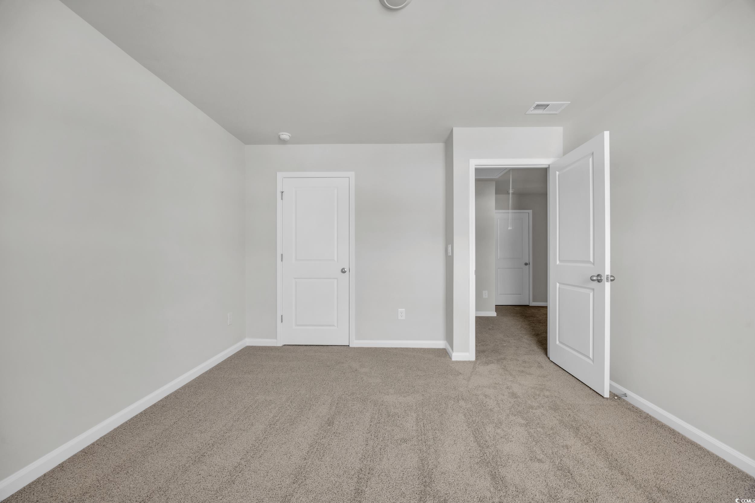 545 Goldstar Street Conway, SC 29526 - Photo 24 of 37 Unfurnished bedroom featuring light colored carpet