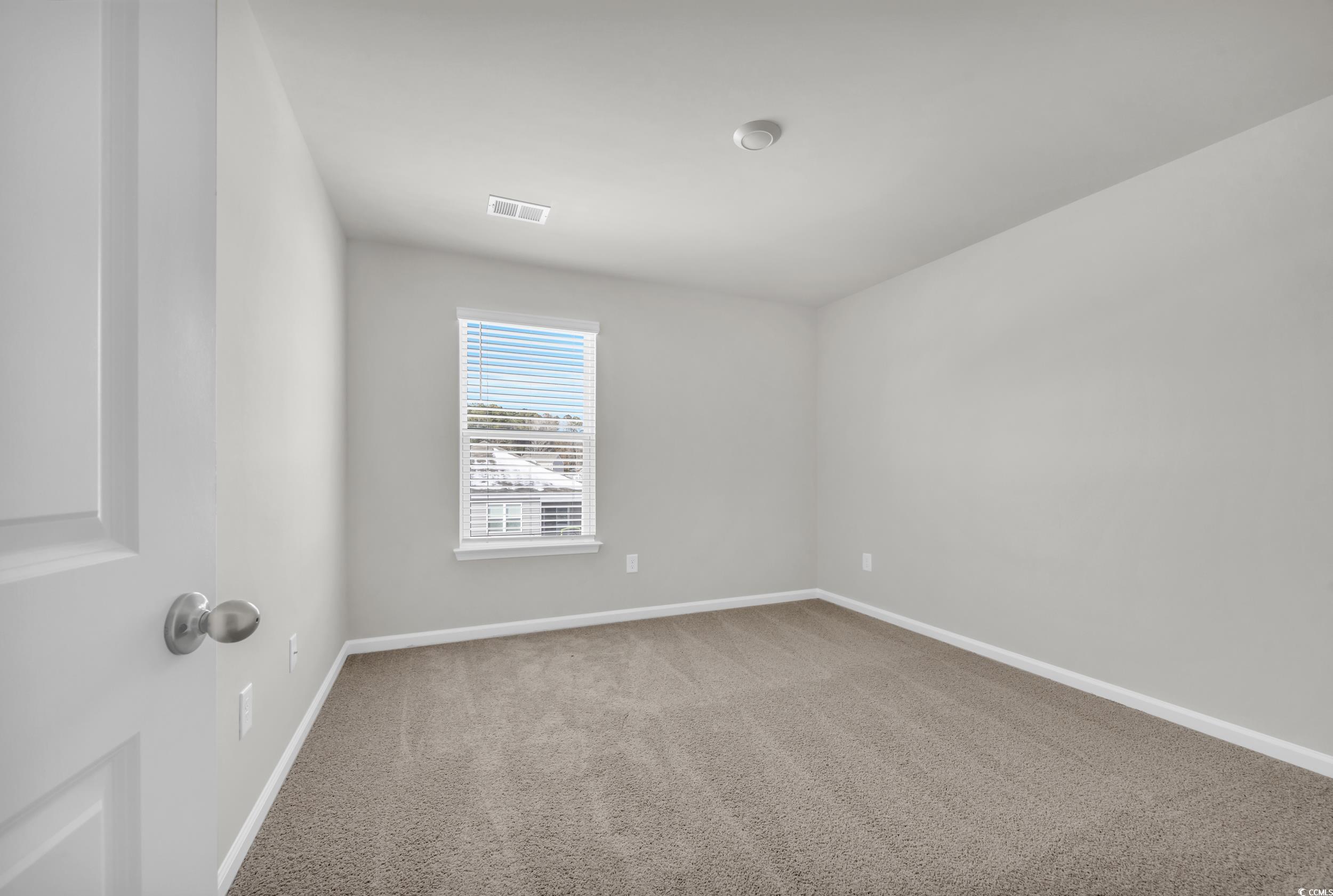 545 Goldstar Street Conway, SC 29526 - Photo 26 of 37 Empty room featuring carpet