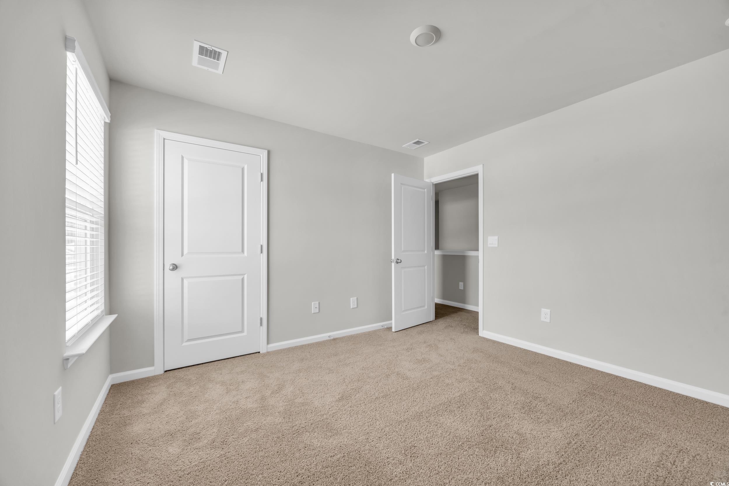 545 Goldstar Street Conway, SC 29526 - Photo 29 of 37 Unfurnished bedroom featuring light carpet