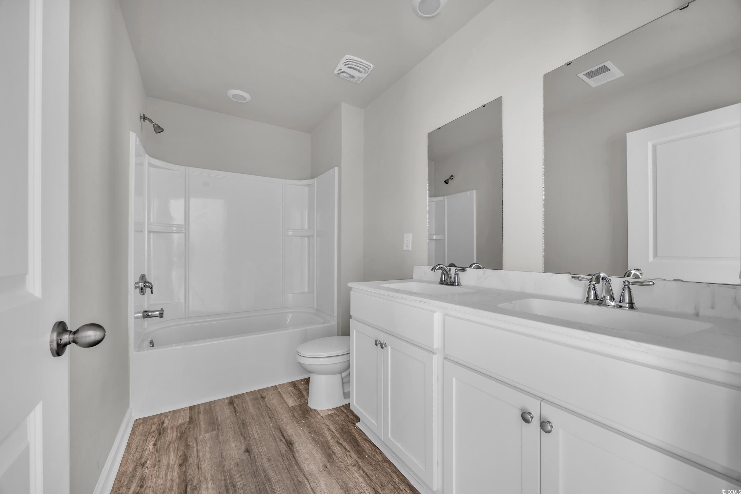 545 Goldstar Street Conway, SC 29526 - Photo 30 of 37 Full bathroom featuring vanity, hardwood / wood-st