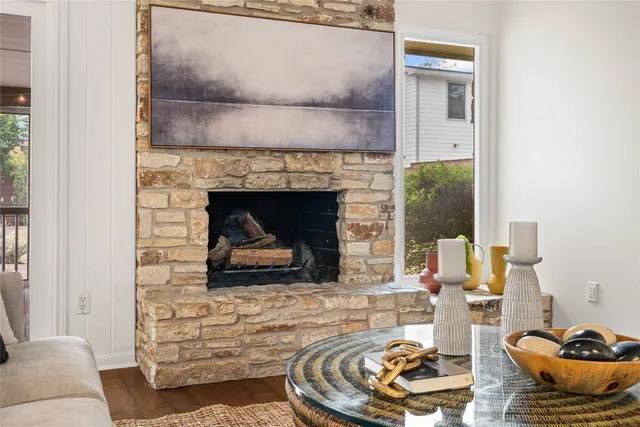 a view of a workspace room with furniture and wooden floor