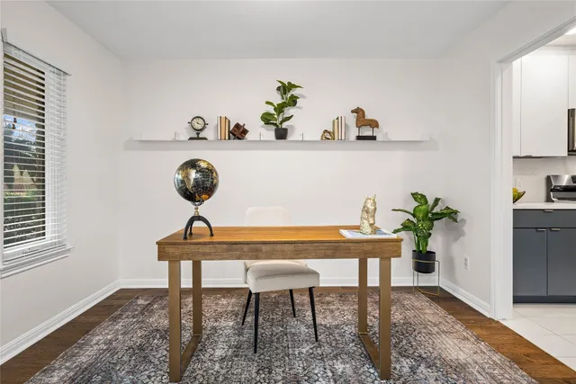 a large white bed in a white room