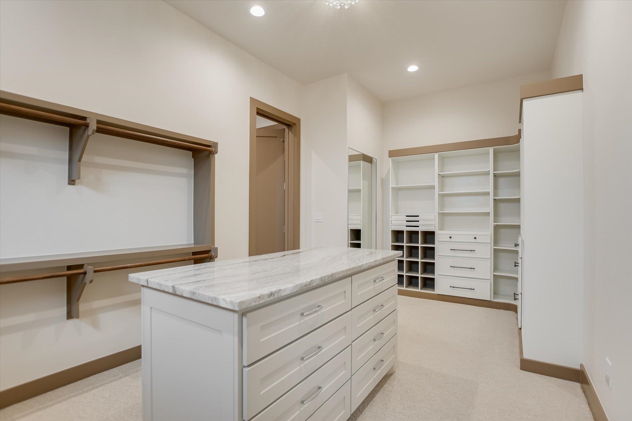 401 Eagle Ridge Burnet, TX 78611 - Photo 15 of 30 a view of walk in closet and bedroom
