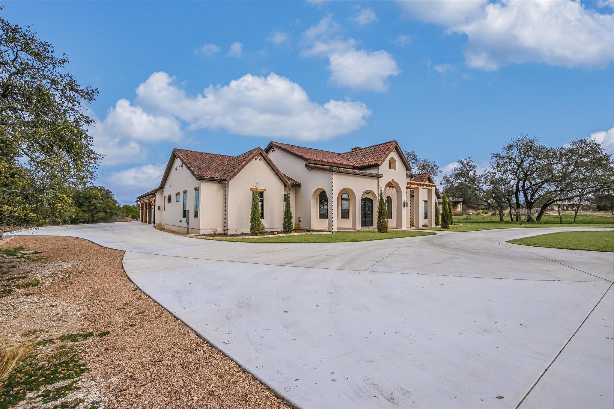 401 Eagle Ridge Burnet, TX 78611 - Photo 2 of 30 a view of house with outdoor space and street view