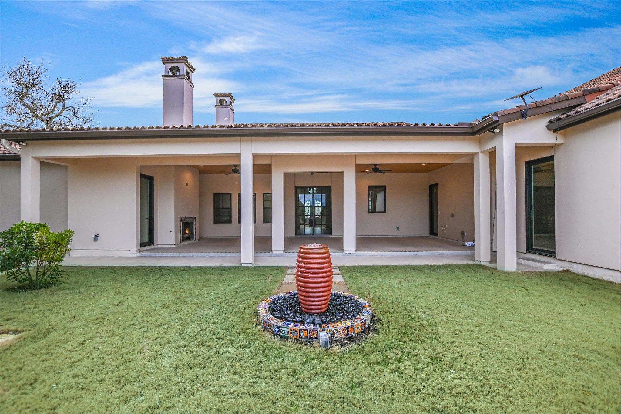 401 Eagle Ridge Burnet, TX 78611 - Photo 27 of 30 a front view of a house with a garden and plants