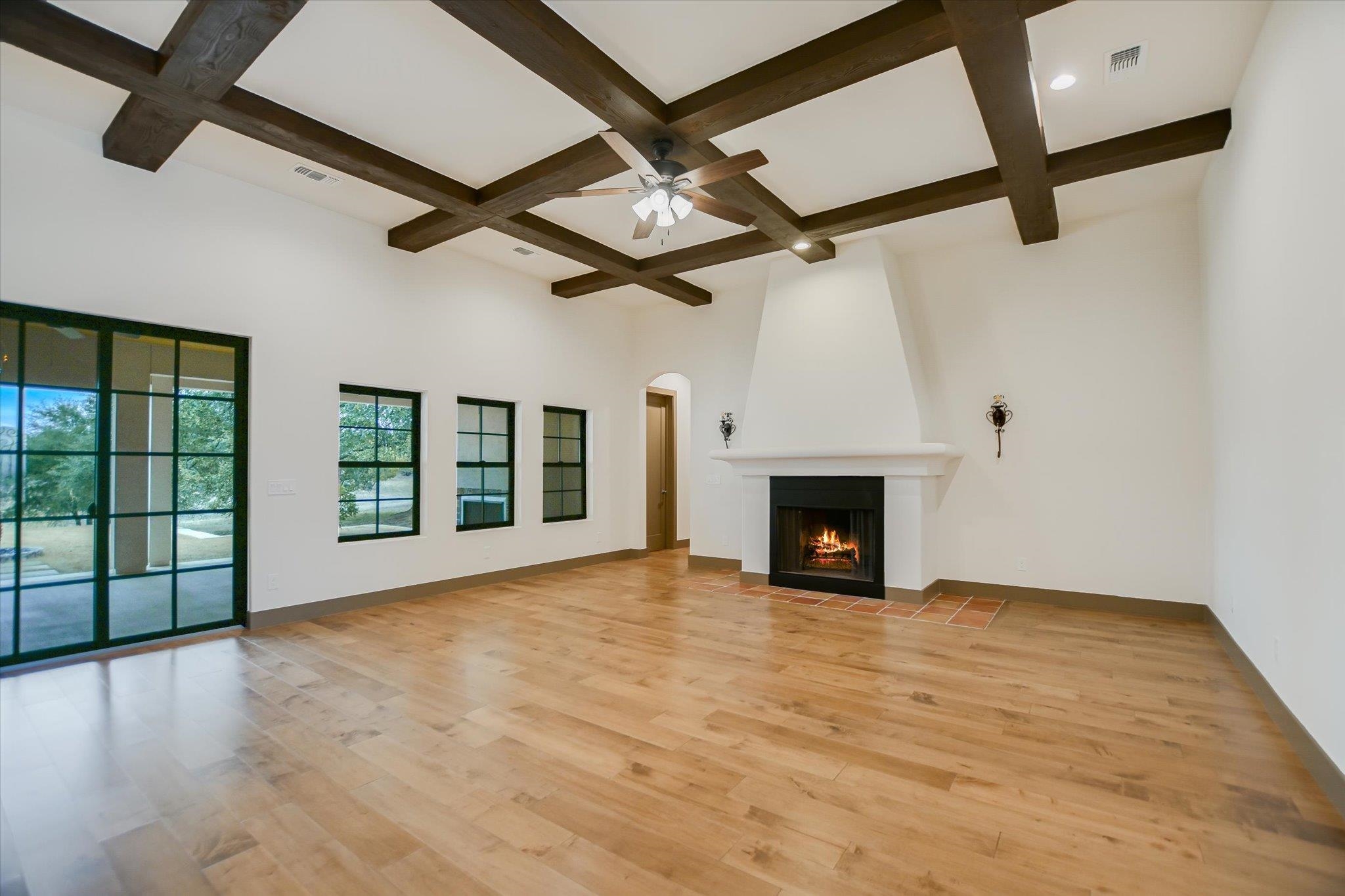 401 Eagle Ridge Burnet, TX 78611 - Photo 3 of 30 a view of an empty room with a fireplace and a window