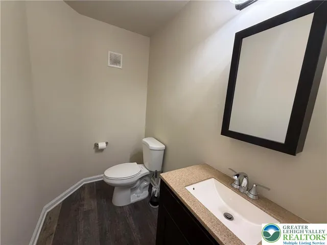 a bathroom with a sink and a toilet