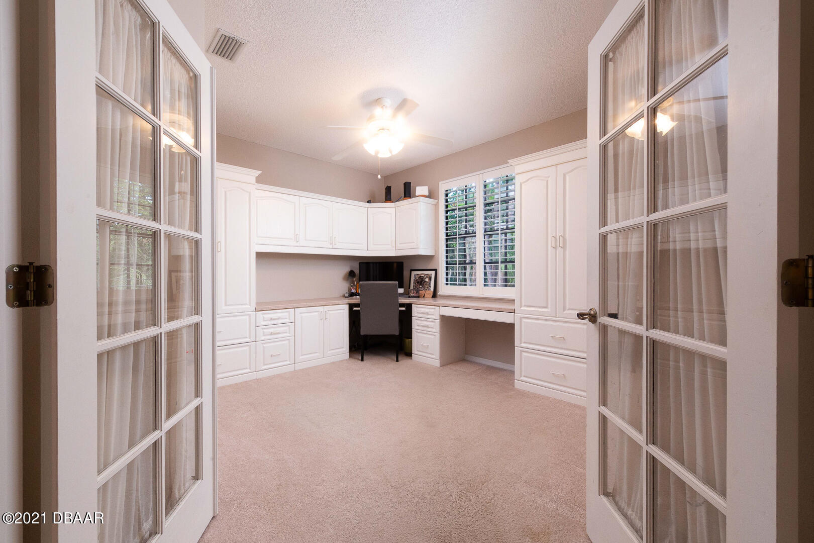 6166 Del Rio Drive Port Orange, FL 32127 - Photo 13 of 53 a view of a kitchen with a sink cabinets and a window