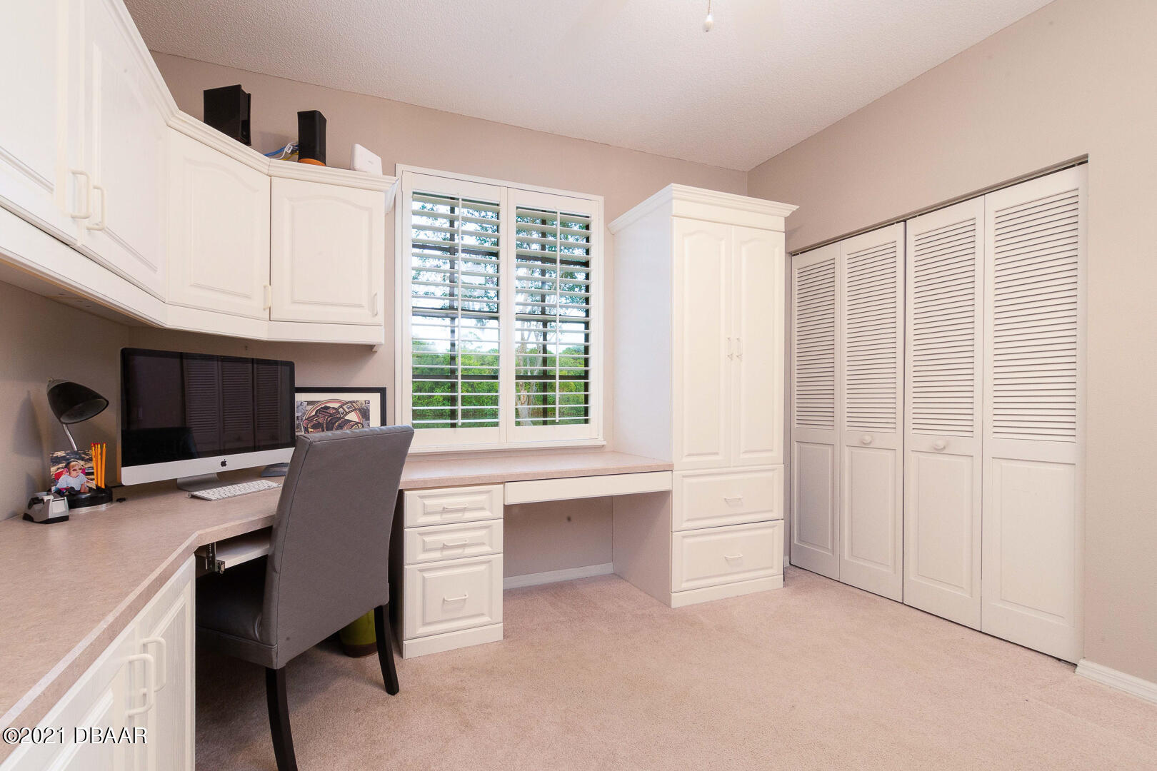 6166 Del Rio Drive Port Orange, FL 32127 - Photo 14 of 53 a view of a workspace with furniture and a window