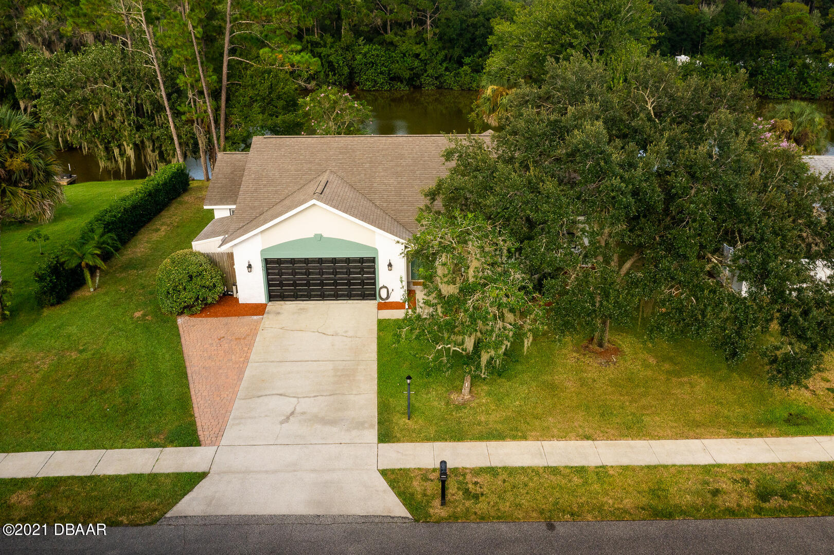 6166 Del Rio Drive Port Orange, FL 32127 - Photo 2 of 53 a view of house with a yard