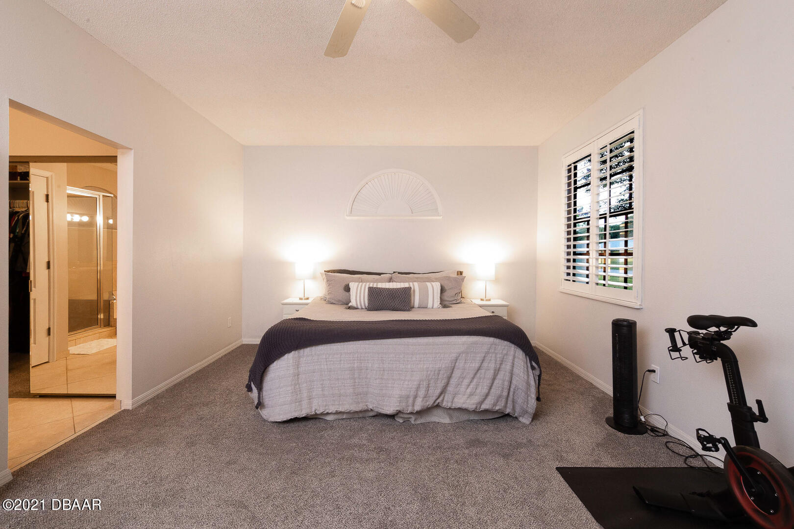 6166 Del Rio Drive Port Orange, FL 32127 - Photo 24 of 53 a bedroom with a bed and wooden floor