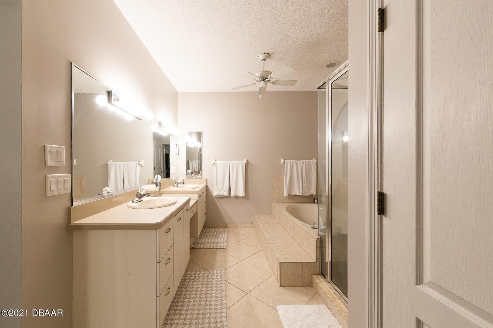 6166 Del Rio Drive Port Orange, FL 32127 - Photo 25 of 53 a bathroom with a sink a toilet a mirror and shower