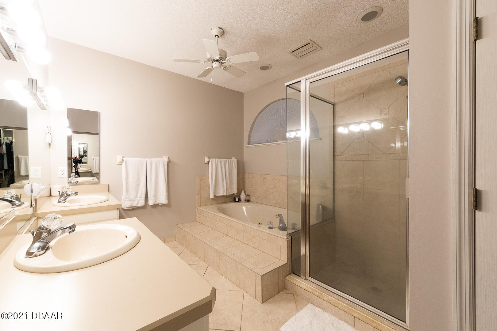 6166 Del Rio Drive Port Orange, FL 32127 - Photo 26 of 53 a bathroom with a sink double vanity and a mirror