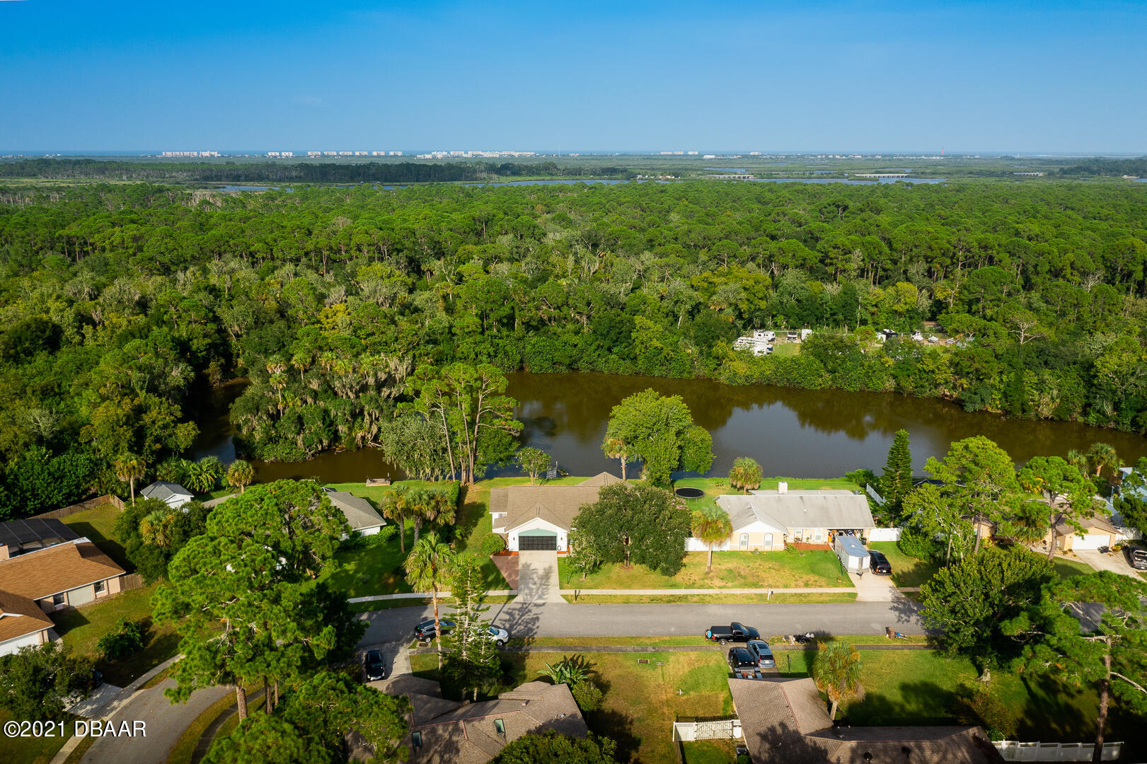 6166 Del Rio Drive Port Orange, FL 32127 - Photo 29 of 53 a view of a lake with a city