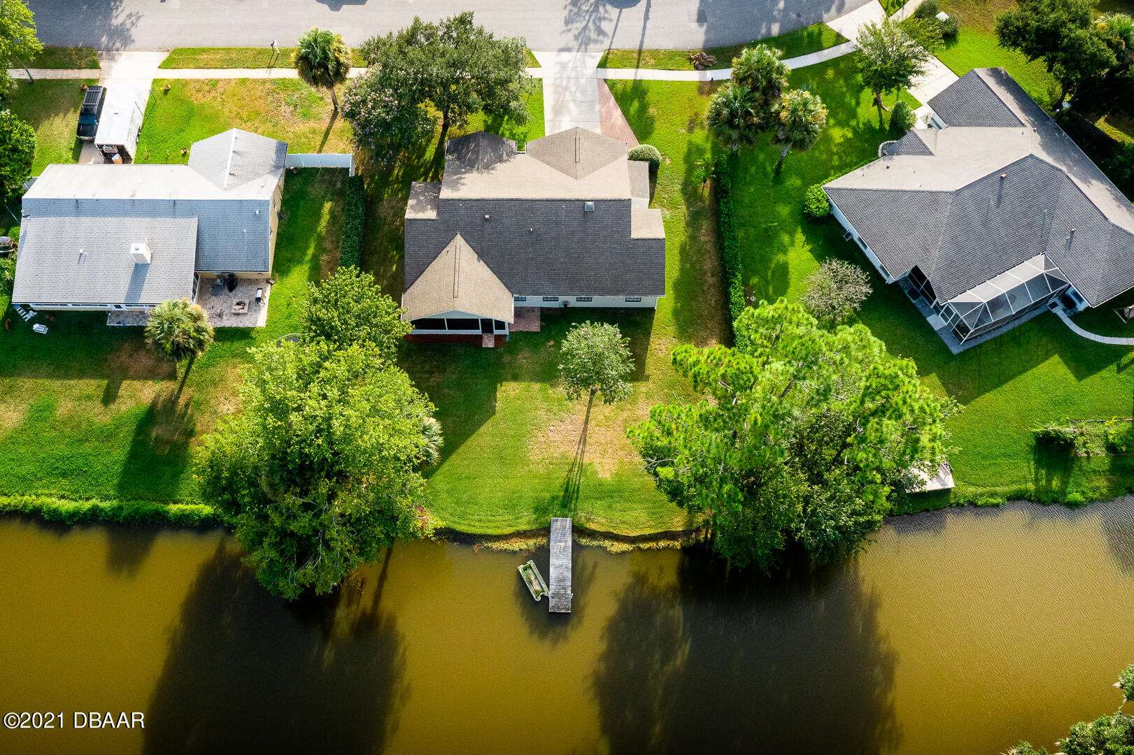 6166 Del Rio Drive Port Orange, FL 32127 - Photo 33 of 53 an aerial view of a house with swimming pool and garden
