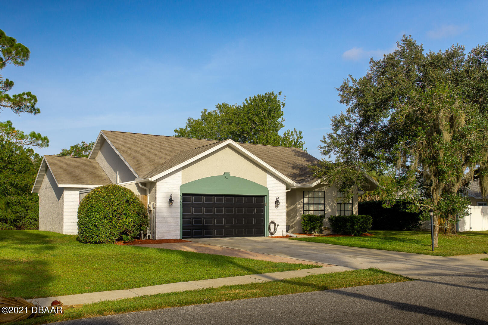 6166 Del Rio Drive Port Orange, FL 32127 - Photo 39 of 53 a front view of a house with a yard